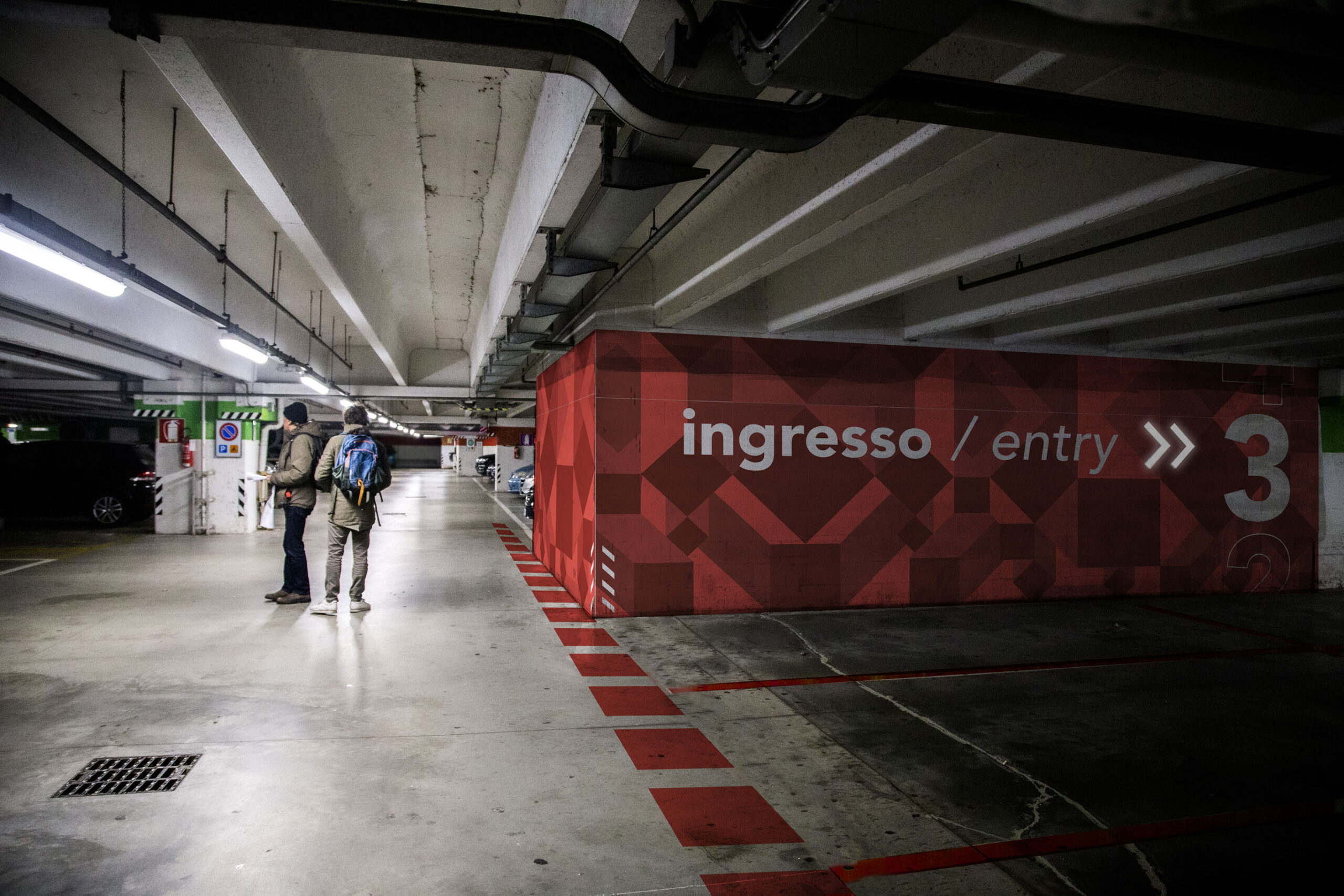 Fiumara parking lot wayfinding red designed by most