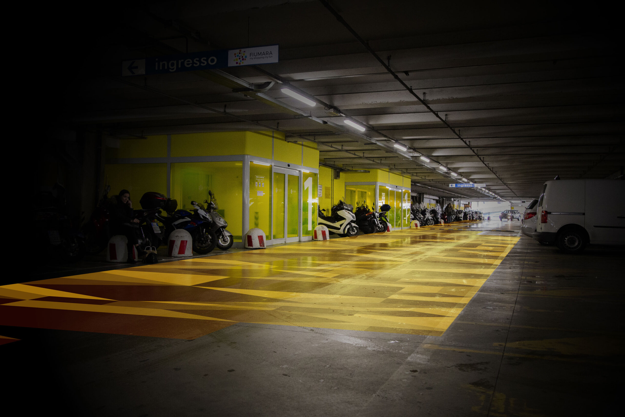 Fiumara parking lot wayfinding yellow designed by most